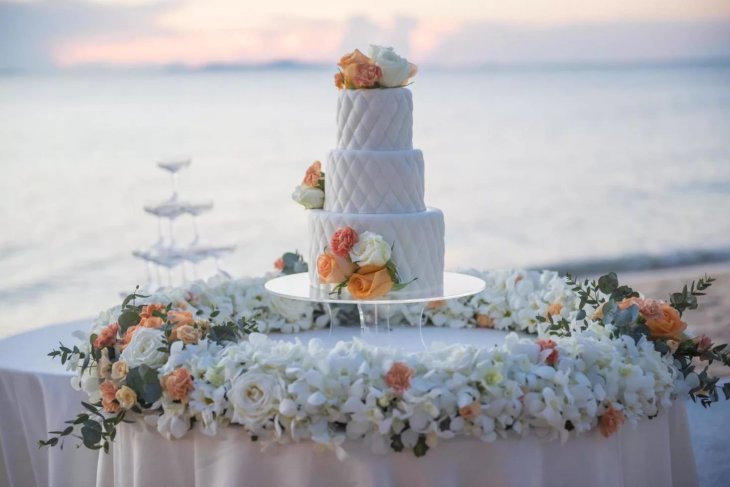 wedding cake at sunset beach wedding free photo jpeg